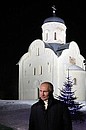 Vladimir Putin answers a journalist’s question following Christmas mass.