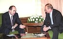 President Vladimir Putin meeting with Armenian President Robert Kocharian.