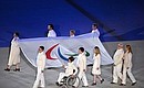 XI Paralympic Winter Games opening ceremony. Carrying the Russian national flag. Photo: RIA Novosti