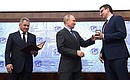 At the Russian Geographical Society medal and certificate award ceremony. A small silver medal went to the Tomsk Regional Branch of the Russian Geographical Society for active research to study the Siberian region, Russia and the world. Chair of the branch Eduard Galazhinsky received the award.