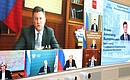 Участники совещания по вопросам социально-экономического развития Красноярского края (в режиме видеоконференции).