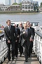 Vladimir Putin and Prince Andrew, Duke of York, boarding the Russian patrol ship Neustrashimy.