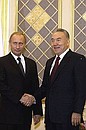 President Putin and President Nazarbayev before extended Russian-Kazakh talks.