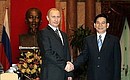 During the official welcome ceremony. With Vietnamese President Nguyen Minh Triet.