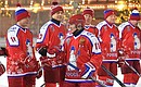 Before a friendly game of the All-Russian Night Hockey League. Vladimir Putin greets the players.
