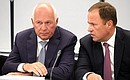 Director-General of Rostec State Corporation Sergei Chemezov, and Presidential Plenipotentiary Envoy to the Volga Federal District Igor Komarov (right) prior to the Military-Industrial Commission meeting.
