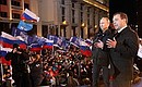 Дмитрий Медведев и Владимир Путин на митинге на Манежной площади.
