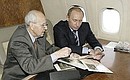Во время перелета в Польшу с ветераном Иваном Мартынушкиным.