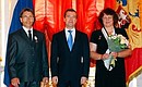 Dmitry Medvedev presents the Order of Parental Glory to Irina and Sergei Levin, who are raising 9 children.