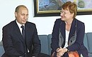 President Putin and his Finnish counterpart, Tarja Halonen.