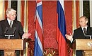 President Putin with President Olafur Ragnar Grimsson of Iceland during a joint news conference following their negotiations.