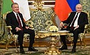 С Президентом Республики Узбекистан Шавкатом Мирзиёевым. Фото: Павел Бедняков, РИА «Новости»