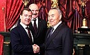 С Президентом Белоруссии Александром Лукашенко и Президентом Казахстана Нурсултаном Назарбаевым перед началом Заседания Высшего Евразийского экономического совета.