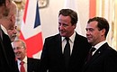 Before the start of Russian-British talks. With British Prime Minister David Cameron.