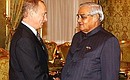 President Vladimir Putin with Indian Prime Minister Atal Bihari Vajpayee.