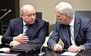 Director of the Foreign Intelligence Service Mikhail Fradkov and permanent member of the Security Council Boris Gryzlov before the meeting with permanent members of the Security Council.