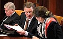 President of the Supreme Court Vyacheslav Lebedev, Chief of Staff of the Presidential Executive Office Sergei Ivanov, and Presidential Aide and Head of the Presidential State-Legal Directorate Larisa Brychyova before the start of a meeting on improving judicial system.