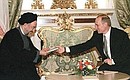 President Putin presenting Iranian President Mohammad Khatami with a Russian-language edition of a book written by the Islamic Republic\'s leader.