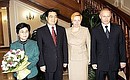 Vladimir and Lyudmila Putin with Chinese President Hu Jintao and his spouse Liu Yongqing.