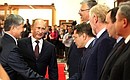 Official welcoming ceremony. Introducing members of the Russian delegation. With President of Kyrgyzstan Almazbek Atambayev.