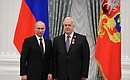 Presenting Russian Federation state decorations. The Order of Alexander Nevsky is awarded to Chairman of the State Duma Committee on Duma Law and Organisation Sergei Popov.