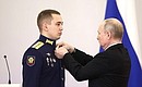 Presentation of Gold Star medals to Heroes of Russia. With Senior Lieutenant Ilya Sponyakov. Photo: Valery Sharifulin, TASS
