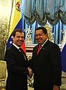 With President of Venezuela Hugo Chavez.