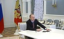 Владимир Путин в режиме видеоконференции принял участие в церемонии подключения двух новых энергоблоков к Единой энергосистеме России.