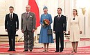 The official welcoming ceremony for Queen Margrethe II of Denmark, Prince Consort Henrik and Crown Prince Frederik at the St George's Hall in the Kremlin.