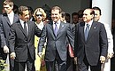 With President of France Nicolas Sarkozy (left) and Prime Minister of Italy Silvio Berlusconi. 
