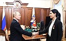 With Hero of Russia Olga Kachura’s daughter Elena Karabet.