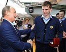 Перед началом просмотра фильма «Легенда № 17» Владимир Путин поздравил с Днём рождения одного из хоккеистов юниорской сборной команды России по хоккею и вручил в подарок часы.