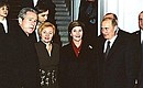 Vladimir Putin and Lyudmila Putina warmly welcoming US President George W. Bush and his spouse Laura Bush.