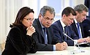 Central Bank Chairman Elvira Nabiullina, Defence Minister Sergei Shoigu, Labour and Social Protection Minister Maxim Topilin and Minister of Regional Development Igor Slyunyayev.