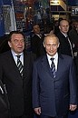 With German Federal Chancellor Gerhard Schroeder during inspection of the Russian exhibition at the Hannover fair.