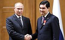 Vladimir Putin presented the President of Turkmenistan Gurbanguly Berdimuhamedov with a state award of the Russian Federation – the Order of Alexander Nevsky. Photo: TASS