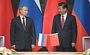 During the signing of Russian-Chinese documents.