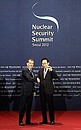 Before the working dinner on behalf of the President of the Republic of Korea for the heads of delegations of the states attending the Nuclear Security Summit. With South Korean President Lee Myung-bak.