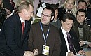 With German journalist Joachim Barts and Russian Deputy Prime Minister Alexander Zhukov at a presentation of the sports development plans for the city of Sochi.