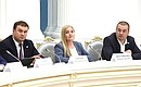 During the meeting of the Russia – Land of Opportunity autonomous non-profit organisation’s Supervisory Board. From left: Acting Governor of the Omsk Region Vitaly Khotsenko, finalist of the Leaders of Russia management competition (2018–2019); Marina Lipatnikova, participant in the Nastavnichestvo (Mentoring) programme of the Senezh Management Workshop and Director of the Bright private extracurricular centre (Vologda); and Dmitry Atamanov, winner of the Leaders of Russia management competition (2018–2019) and project manager of the Russia – Land of Opportunity autonomous non-profit organisation. Photo: Valery Sharifulin, TASS
