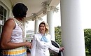 С Мишель Обамой в Белом Доме.