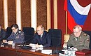 President Putin at a meeting on measures to assure law and order, public safety, and to fight crime, terrorism and extremism. To the left is Internal Affairs Minister Rashid Nurgaliyev, and to the right, Deputy Internal Affairs Minister Mikhail Pankov.