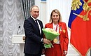 Presenting state decorations to winners of the 2020 Summer Paralympic Games in Tokyo. Yelena Prokofyeva, table tennis champion of the Paralympics, receives the Order of Friendship. Photo: RIA Novosti
