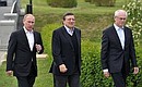 With European Commission President Jose Manuel Barroso (centre) and European Council President Herman Van Rompuy (right).