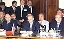 President Vladimir Putin with Russia\'s Security Council Secretary Vladimir Rushailo and Foreign Minister Igor Ivanov, to the right, during the Collective Security Council meeting of Collective Security Treaty Organisation member states.