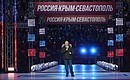 Vladimir Putin gave a speech at the festive event held at Luzhniki as part of the Days of Crimea in Moscow. Photo: TASS
