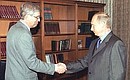 С председателем Центробанка Сергеем Игнатьевым.