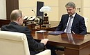 At a meeting with Agriculture Minister Alexander Tkachev.