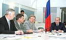 Meeting on the aftermath of floods in regions of Yakutia. President Putin with Railways Minister Nikolai Aksyonenko, Deputy Chief of the President\'s Staff Alexei Abramov and Deputy Prime Minister Alexei Kudrin (left to right).