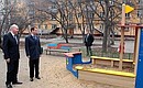 Dmitry Medvedev and Governor of Irkutsk Region Dmitry Mezentsev visited a courtyard of a residential building.